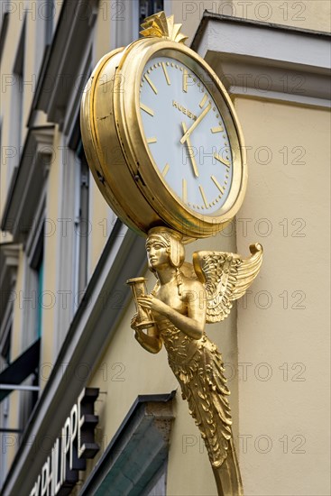 Gilded clock with goddess of the seasons