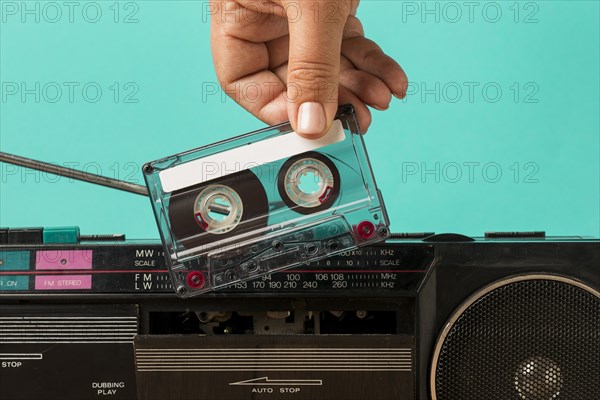 Inserting tape into cassette