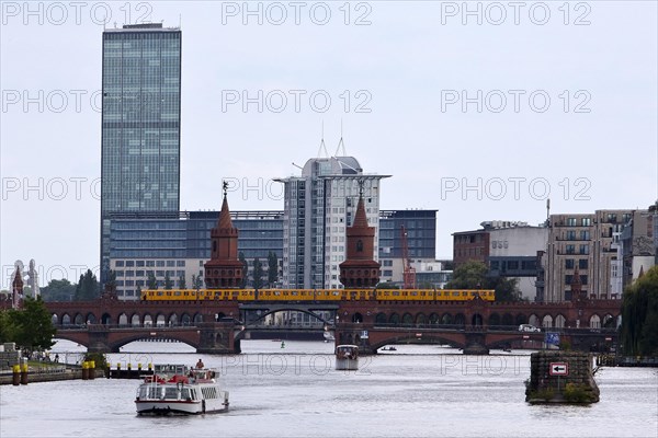 Spree with Oberbaum Bridge and Treptowers high-rise