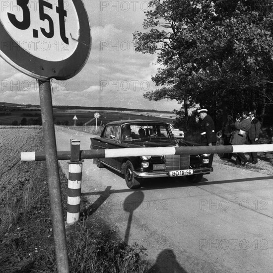 Government representatives with their vehicles in 1966 during a police check at the hitherto secret atomic bunker of the Federal Government in the Ahr valley