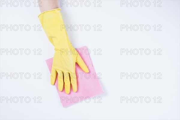 Janitor cleaning with duster white background