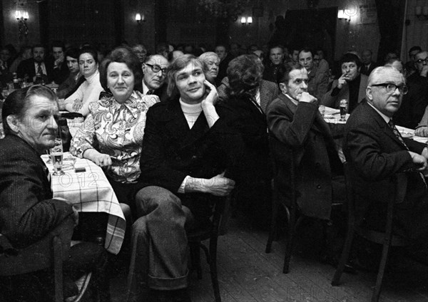 Concerned faces predominate at the tenants' protest meeting of RAG