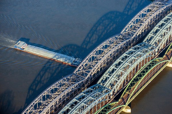 Aerial view of a barge under the Hamburg Elbe bridge