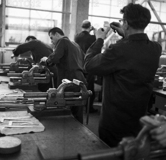 Older workers are retrained in metal trades as locksmiths and lathe operators in the Krupp AG workshops in Bochum in 1967