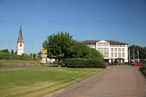 Castle Hotel Reinhartshausen and church tower of St. Martin Church