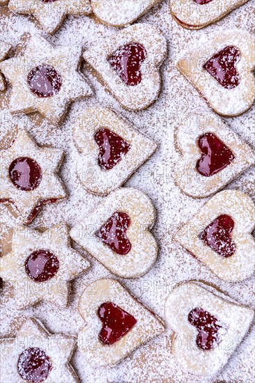 Freshly baked Spitzbuben in the shape of a heart