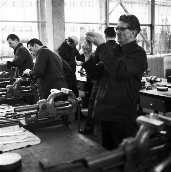 Older workers are retrained in metal trades as locksmiths and lathe operators in the Krupp AG workshops in Bochum in 1967