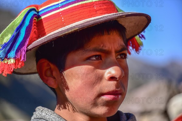 Boy in traditional dress of the Quechua Indians