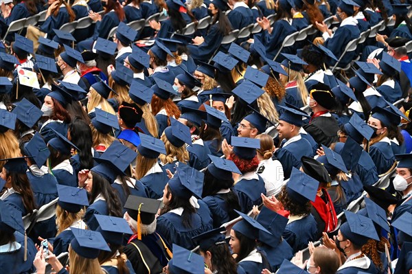 College students of George Washington University in the traditional robe and mortarboard on their graduation day