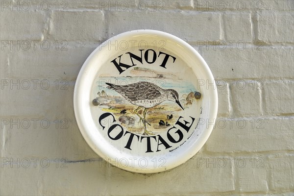 Sign with house name