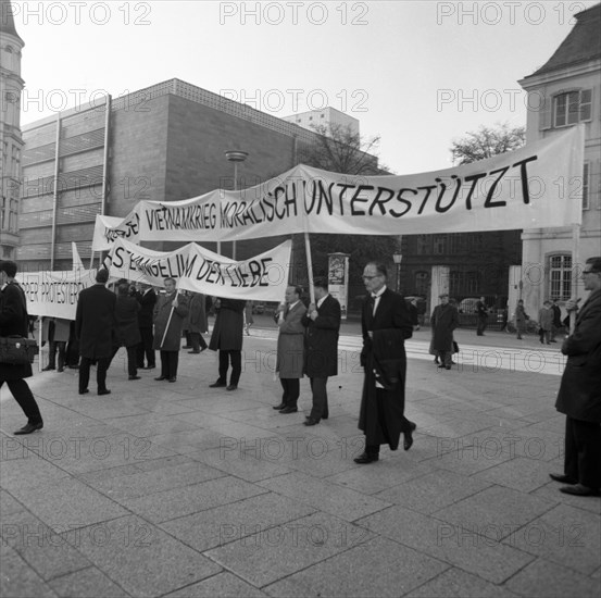 Those who support the Vietnam War betray the gospel of love. Pastors protest. With these slogans and sometimes wearing their robes