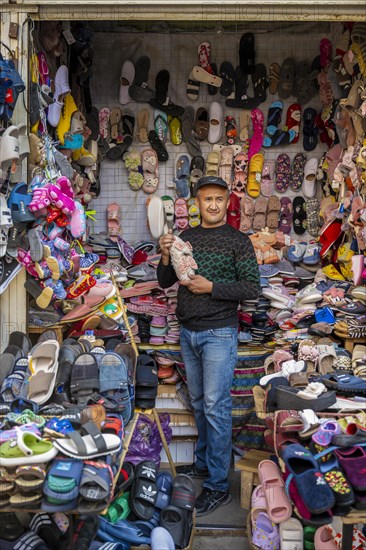 Vendor of shoes in his stall