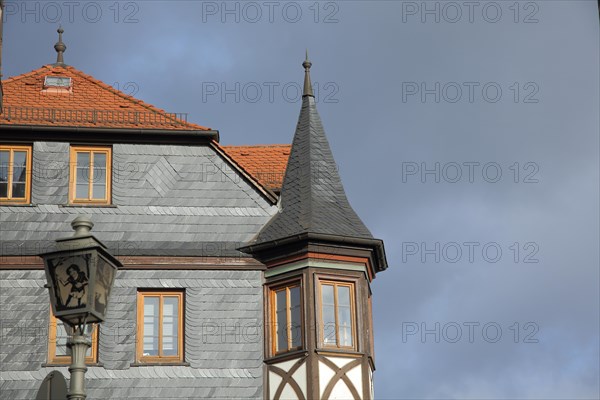 House Old Three Knights with tower helmet and streetlamp