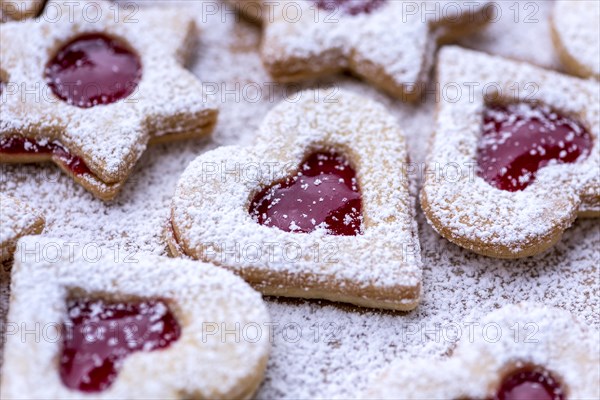 Freshly baked Spitzbuben in the shape of a heart