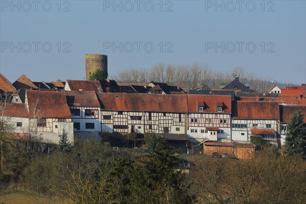 Barn front with historic Hutt tower in Walsdorf