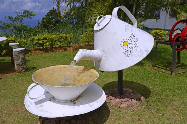 Oversized teapot and teacup on the grounds of the Seyte Tea Company