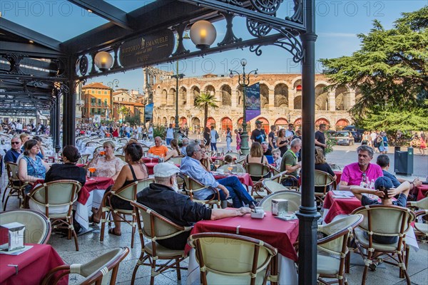 Restaurant terraces in Piazza Bra in front of the Arena di Verona