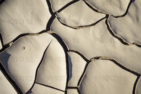 Drought cracks display the dried out mud. Climate change in Africa. Swakop river