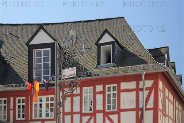 Half-timbered house and restaurant Eltvinum with nose shield