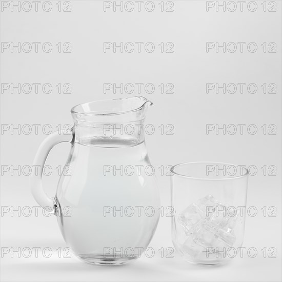 Jug water glass filled with ice