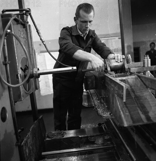 Older workers are retrained in metal trades as locksmiths and lathe operators in the Krupp AG workshops in Bochum in 1967