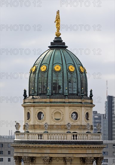 The domed tower of the German Cathedral at Gendarmenmarkt in front of newly built skyscrapers