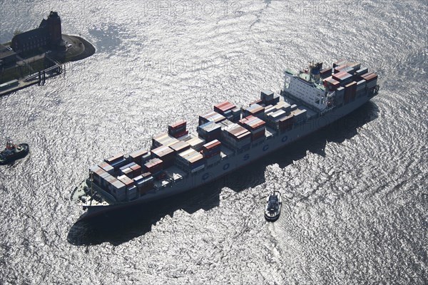 Aerial view of a container ship of the Chinese shipping company COSCO