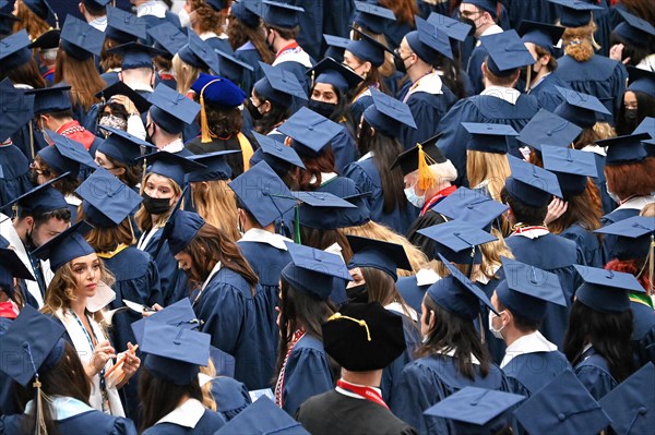 College students of George Washington University in the traditional robe and mortarboard on their graduation day