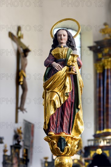 Female saint figure with host chalice