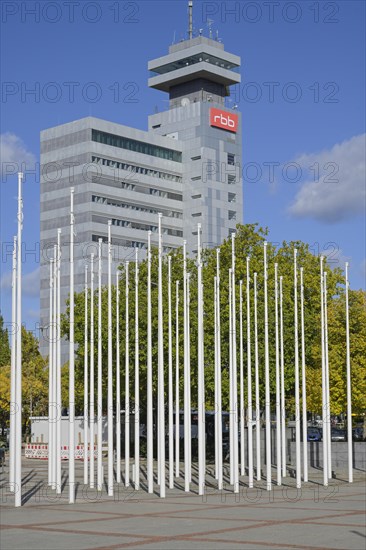 Flagpoles in front of the fairground