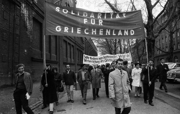 A demonstration with folklore elements in Duesseldorf on 25. 5. 1971 against the rule of a military junta and for democracy in their country by Greek guest workers and Germans