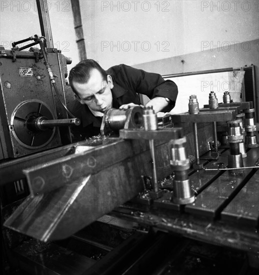 Older workers are retrained in metal trades as locksmiths and lathe operators in the Krupp AG workshops in Bochum in 1967