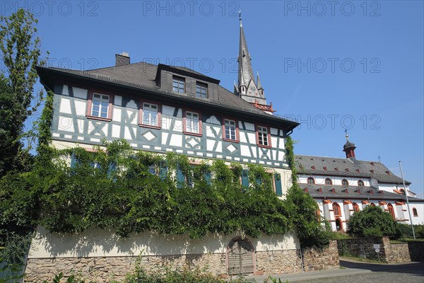 Half-timbered house and late Gothic St. Mark's Church