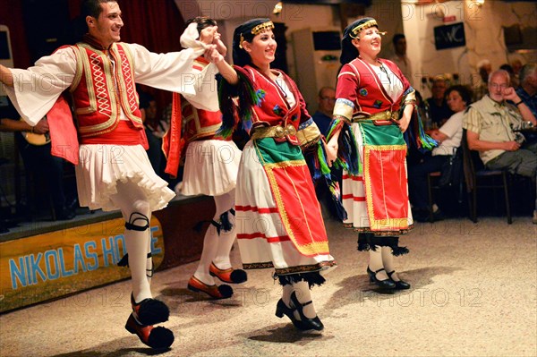 Tourists encounter impressive evidence of Roman and Greek history on a round trip through western Turkey and to the Greek island of Rhodes. The picture shows: Folk dance group in front of and with tourists on the island of Rhodes in Rhodes