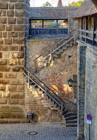 Stairway to the historic town wall with covered battlements