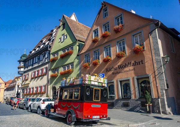 Decorated vintage bus in front of the house of Kaethe Wohlfahrt Christmas Village