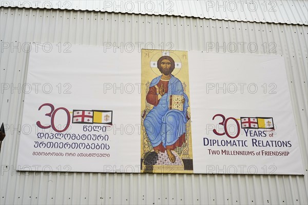 Banner next to a church in the Old City