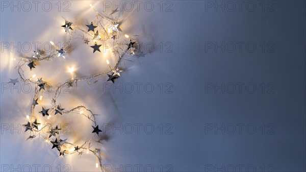 Burning garland with spangles table