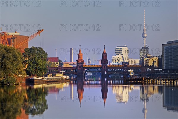 Spree in the early morning with Oberbaum Bridge and TV Tower