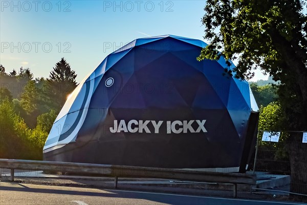 Open Air Museum Exhibition space with exhibition on racing history in the form of walk-in giant helmet with name of racing driver Jacky Ickx