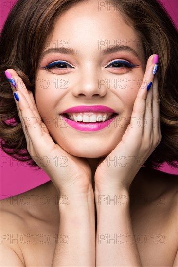 Beautiful model girl with bright makeup
