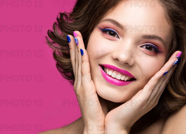 Beautiful model girl with bright makeup