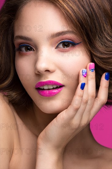 Beautiful model girl with bright makeup