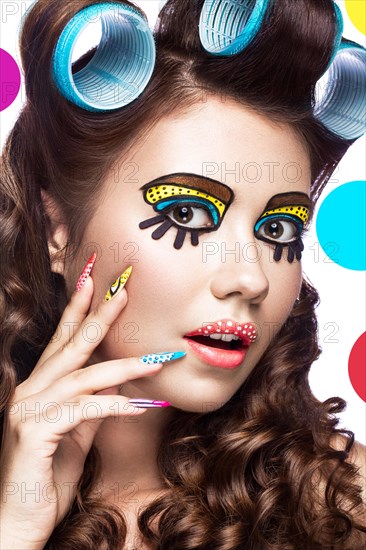 Photo of surprised young woman with professional comic pop art make-up and design manicure. Creative beauty style and nails. Photos shot in studio