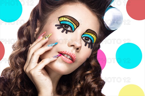 Photo of surprised young woman with professional comic pop art make-up and design manicure. Creative beauty style and nails. Photos shot in studio