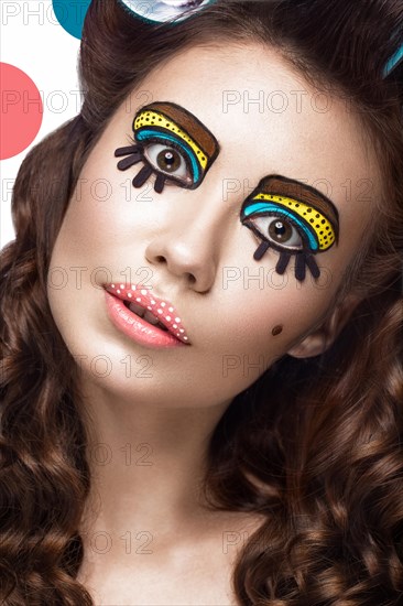 Photo of surprised young woman with professional comic pop art make-up and design manicure. Creative beauty style and nails. Photos shot in studio