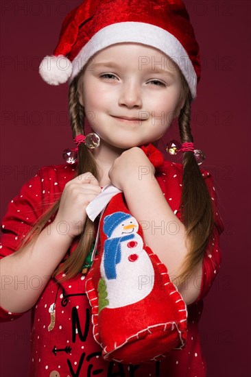 Funny little girl in the New Year's image