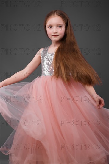 Little girl in a pink dress