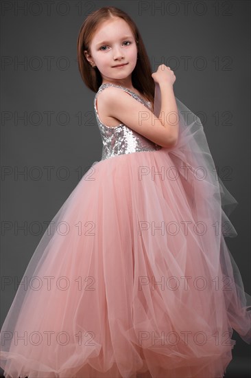 Little girl in a pink dress