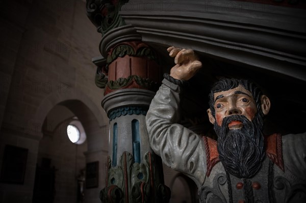 Stucco pulpit by Konrad Wagner with larger-than-life supporting atlas